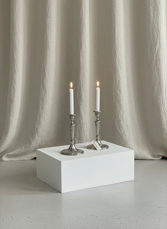 Candeleros de metal plateado